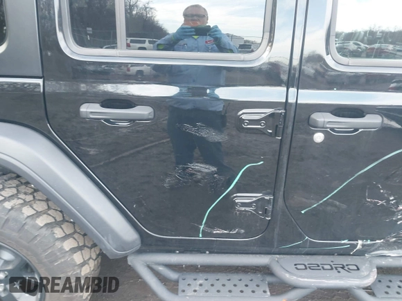 2022 Jeep Wrangler Unlimited Sport S with VIN 1C4HJXDG1NW141244, listed as a IAAI auction lot 41532388 with 27,829 mi miles. Bid and sale history available at carsss.com. Image 17.
