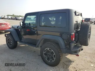 2015 Jeep Wrangler Rubicon Hard Rock z VIN 1C4BJWCG9FL714606, wystawiony jako Copart lot #68521014 z przebiegiem 35 187 mil mil oraz Szkoda całkowita • Salvage title. Historia ofert i sprzedaży dostępna na DreamBid. Obrazek 2.