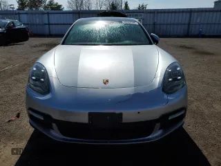 2018 Porsche Panamera z VIN WP0AA2A75JL110423, wystawiony jako Copart lot #48962705 z przebiegiem 118 453 mil mil oraz Czysty tytuł • Clean title. Historia ofert i sprzedaży dostępna na DreamBid. Obrazek 5.