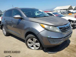 2011 Kia Sportage LX z VIN KNDPBCA20B7170217, wystawiony jako IAAI lot #42303069 z przebiegiem 186 994 mil mil oraz . Historia ofert i sprzedaży dostępna na DreamBid. Obrazek 1.