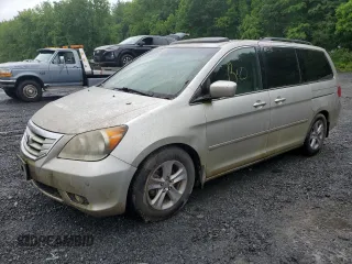 2008 Honda Odyssey Touring z VIN 5FNRL38918B069764, wystawiony jako Copart lot #60375035 z przebiegiem 281 904 mil mil oraz Czysty tytuł • Clean title. Historia ofert i sprzedaży dostępna na DreamBid. Obrazek 1.