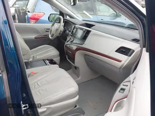 2011 Toyota Sienna XLE AAS with VIN 5TDYK3DCXBS114882, listed as a IAAI auction lot 42007417 with 144,087 mi miles and . Bid and sale history available at DreamBid. Image 5.