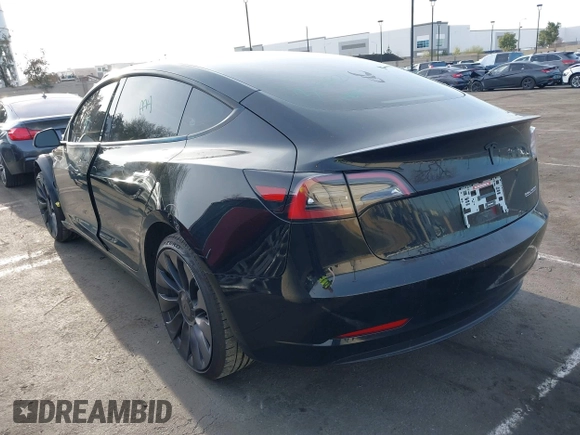 2023 Tesla Model 3 Performance z VIN 5YJ3E1EC3PF716085, wystawiony jako IAAI lot #41911684 z przebiegiem 45 184 mil mil oraz . Historia ofert i sprzedaży dostępna na DreamBid. Obrazek 3.