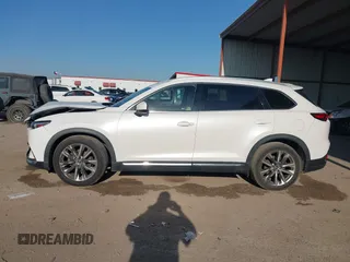2016 Mazda CX-9 Grand Touring z VIN JM3TCADY6G0125547, wystawiony jako IAAI lot #41997445 z przebiegiem 129 179 mil mil oraz . Historia ofert i sprzedaży dostępna na DreamBid. Obrazek 14.