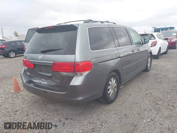 2009 Honda Odyssey EX-L with VIN 5FNRL38649B028066, listed as a IAAI auction lot 42059473 with 193,122 mi miles. Bid and sale history available at carsss.com. Image 4.