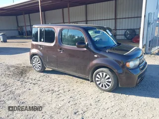 2011 Nissan Cube S z VIN JN8AZ2KR8BT202933, wystawiony jako IAAI lot #41701542 z przebiegiem 162 626 mil mil oraz . Historia ofert i sprzedaży dostępna na DreamBid. Obrazek 1.