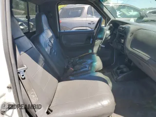 2001 Ford Ranger XL z VIN 1FTYR10D71PB77672, wystawiony jako Copart lot #56221145 z przebiegiem 267 375 mil mil oraz Nie do naprawy • Non repairable. Historia ofert i sprzedaży dostępna na DreamBid. Obrazek 11.