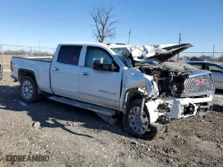 2015 GMC Sierra 2500HD Denali with VIN 1GT120E82FF597607, listed as a Copart auction lot 82844954 with 0 mi miles and Salvage Title. Bid and sale history available at carsss.com. Image 4.
