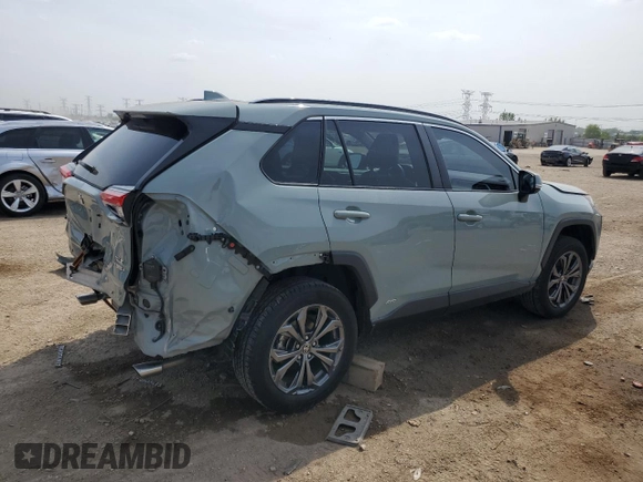 2022 Toyota RAV4 Hybrid XLE Premium with VIN 4T3B6RFV8NU101319, listed as a Copart auction lot 60987535 with 100,070 mi miles and Salvage title. Bid and sale history available at DreamBid. Image 3.