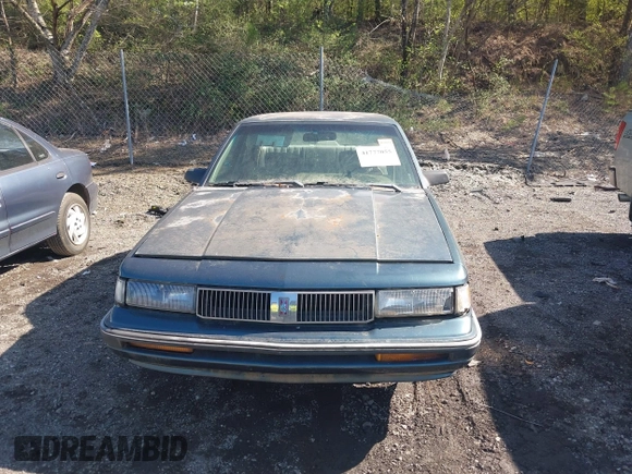 1993 Oldsmobile Cutlass Ciera S with VIN 1G3AG55N5P6317040, listed as a IAAI auction lot 41777055 with 208,984 mi miles and . Bid and sale history available at DreamBid. Image 12.