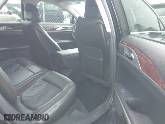 2014 Lincoln MKZ with VIN 3LN6L2J94ER811877, listed as a IAAI auction lot 42022519 with 178,972 mi miles. Bid and sale history available at carsss.com. Image 8.