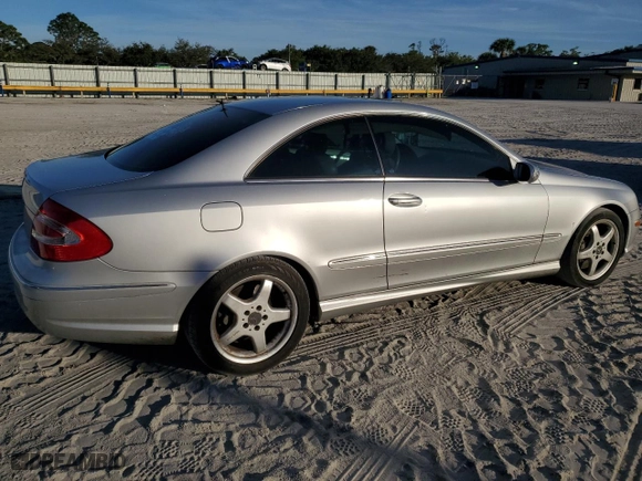 2003 Mercedes-Benz CLK-Class 5.0L with VIN WDBTJ75JX3F052823, listed as a Copart auction lot 87321334 with 132,774 mi miles and Salvage Title. Bid and sale history available at carsss.com. Image 3.