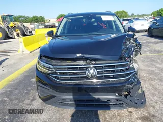 2024 Volkswagen Tiguan SE with VIN 3VVNB7AXXRM199400, listed as a IAAI auction lot 42216941 with 11,581 mi miles and . Bid and sale history available at DreamBid. Image 12.
