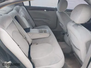 2009 Buick Lucerne CX-2 with VIN 1G4HP57M09U136974, listed as a IAAI auction lot 41557585 with 109,498 mi miles. Bid and sale history available at carsss.com. Image 8.