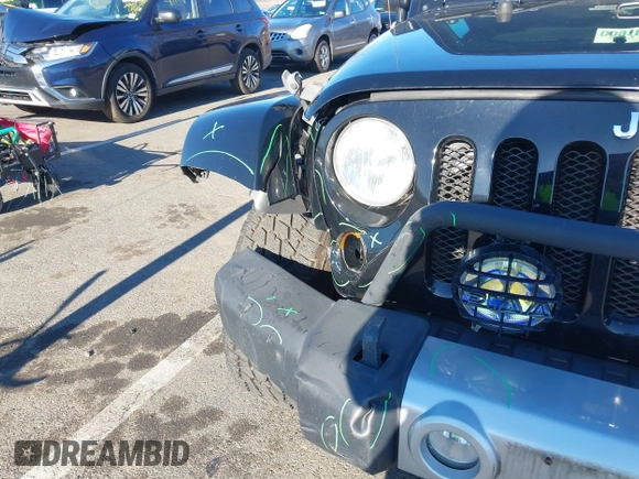 2010 Jeep Wrangler Unlimited Sahara with VIN 1J4HA5H16AL215659, listed as a IAAI auction lot 41749218 with 55,544 mi miles. Bid and sale history available at carsss.com. Image 17.