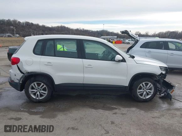 2013 Volkswagen Tiguan S z VIN WVGAV3AX6DW610678, wystawiony jako IAAI lot #41544865 z przebiegiem 102 948 mil mil oraz . Historia ofert i sprzedaży dostępna na DreamBid. Obrazek 13.