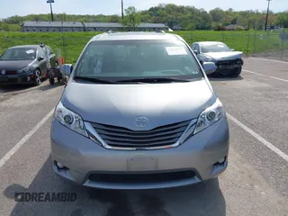 2014 Toyota Sienna XLE z VIN 5TDYK3DC0ES451307, wystawiony jako IAAI lot #42093569 z przebiegiem 105 721 mil mil oraz . Historia ofert i sprzedaży dostępna na DreamBid. Obrazek 13.