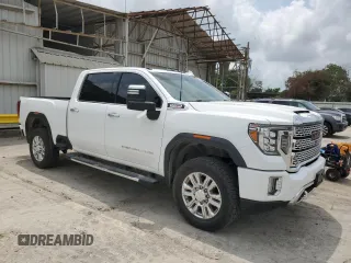 2020 GMC Sierra 2500HD Denali z VIN 1GT49REY5LF210606, wystawiony jako Copart lot #54699795 z przebiegiem 43 009 mil mil oraz Czysty tytuł • Clean title. Historia ofert i sprzedaży dostępna na DreamBid. Obrazek 4.