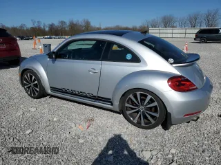 2012 Volkswagen Beetle 2.0T Turbo w/Sun/Snd/Nav PZEV with VIN 3VWVA7AT6CM662796, listed as a Copart auction lot 51649775 with 61,785 mi miles and Clean Title. Bid and sale history available at carsss.com. Image 2.