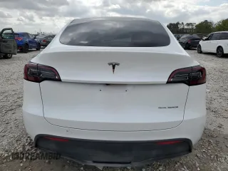 2024 Tesla Model Y Long Range with VIN 7SAYGDEE1RA234401, listed as a Copart auction lot 44199495 with 17,900 mi miles and Clean Title. Bid and sale history available at DreamBid. Image 6.