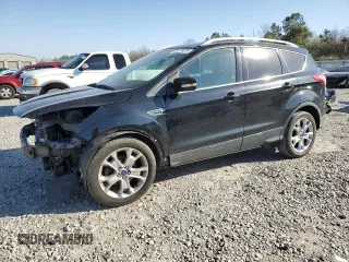 2016 Ford Escape Titanium with VIN 1FMCU0JX5GUB95220, listed as a Copart auction lot 48176575 with 121,210 mi miles and Salvage Title. Bid and sale history available at carsss.com. Image 1.