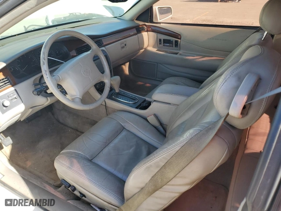 2000 Cadillac Eldorado with VIN 1G6EL12Y0YB702117, listed as a Copart auction lot 80297854 with 124,851 mi miles and Salvage Title. Bid and sale history available at carsss.com. Image 8.