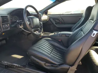 2001 Chevrolet Camaro Z28 z VIN 2G1FP22G712124948, wystawiony jako Copart lot #76083164 z przebiegiem 21 108 mil mil oraz Szkoda całkowita • Salvage title. Historia ofert i sprzedaży dostępna na DreamBid. Obrazek 7.