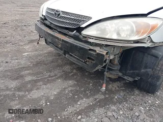 2003 Toyota Camry LE with VIN 4T1BE30K73U704489, listed as a IAAI auction lot 41905778 with Not Provided miles and . Bid and sale history available at DreamBid. Image 6.