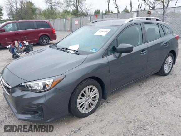 2018 Subaru Impreza Premium z VIN 4S3GTAD61J3703780, wystawiony jako IAAI lot #42081604 z przebiegiem 79 757 mil mil oraz . Historia ofert i sprzedaży dostępna na DreamBid. Obrazek 2.