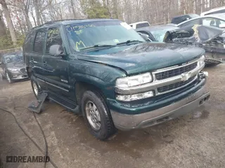 2002 Chevrolet Tahoe LT with VIN 1GNEK13ZX2J277968, listed as a IAAI auction lot 41586260 with 336,190 mi miles. Bid and sale history available at carsss.com. Image 1.