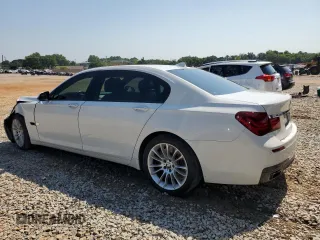 2013 BMW 7 Series 750Li with VIN WBAYE8C56DD132217, listed as a Copart auction lot 61976145 with 146,860 mi miles and Salvage title. Bid and sale history available at DreamBid. Image 2.