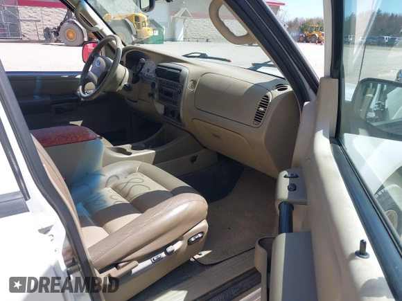 2004 Ford Explorer Sport Trac XLS z VIN 1FMDU77K94UC07938, wystawiony jako IAAI lot #42099383 z przebiegiem 232 789 mil mil oraz . Historia ofert i sprzedaży dostępna na DreamBid. Obrazek 5.