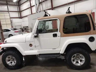 1997 Jeep Wrangler Sahara with VIN 1J4FY49S3VP529837, listed as a IAAI auction lot 41752978 with 138,024 mi miles. Bid and sale history available at carsss.com. Image 14.