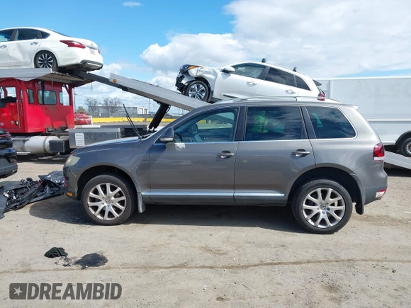 2010 Volkswagen Touareg VR6 with VIN WVGBF7A96AD002466, listed as a IAAI auction lot 41709052 with 204,819 mi miles and . Bid and sale history available at DreamBid. Image 14.