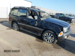 2000 Toyota Land Cruiser with VIN JT3HT05J2Y0101522, listed as a IAAI auction lot 41965792 with 187,172 mi miles. Bid and sale history available at carsss.com. Image 1.