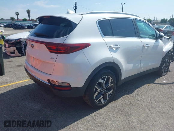 2021 Kia Sportage EX with VIN KNDPN3ACXM7936960, listed as a IAAI auction lot 42115357 with 27,964 mi miles and . Bid and sale history available at DreamBid. Image 4.
