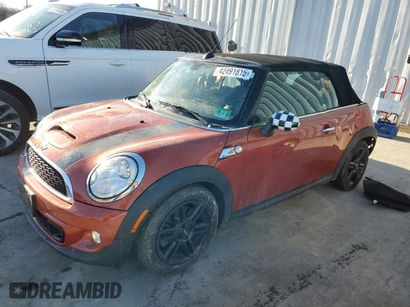 2015 MINI Convertible S z VIN WMWZP3C52FT708282, wystawiony jako Copart lot #42491815 z przebiegiem 31 586 mil mil oraz Szkoda całkowita • Salvage title. Historia ofert i sprzedaży dostępna na DreamBid. Obrazek 1.