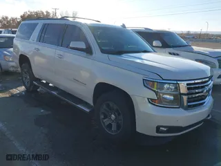 2015 Chevrolet Suburban LT with VIN 1GNSKJKC5FR630995, listed as a IAAI auction lot 40988296 with 158,090 mi miles. Bid and sale history available at carsss.com. Image 1.