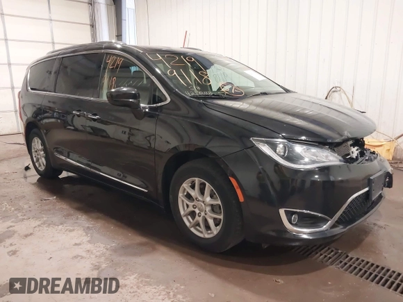 2020 Chrysler Pacifica Touring L with VIN 2C4RC1BG9LR140072, listed as a IAAI auction lot 42199118 with 93,557 mi miles and . Bid and sale history available at DreamBid. Image 1.