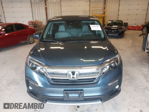 2021 Honda Pilot EX-L z VIN 5FNYF6H54MB082455, wystawiony jako IAAI lot #42343787 z przebiegiem 25 954 mil mil oraz . Historia ofert i sprzedaży dostępna na DreamBid. Obrazek 12.