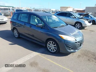 2012 Mazda 5 Touring with VIN JM1CW2CL0C0140471, listed as a IAAI auction lot 41712614 with 123,958 mi miles. Bid and sale history available at carsss.com. Image 1.