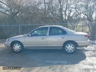 1999 Mercury Mystique GS with VIN 1MEFM6530XK635463, listed as a IAAI auction lot 41478903 with 87,911 mi miles. Bid and sale history available at carsss.com. Image 14.