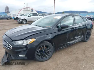 2020 Ford Fusion SE with VIN 3FA6P0HD1LR179527, listed as a IAAI auction lot 39131081 with 108,022 mi miles and . Bid and sale history available at DreamBid. Image 2.