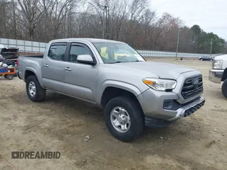 2018 Toyota Tacoma SR with VIN 3TMCZ5AN4JM130307, listed as a IAAI auction lot 41541477 with 74,369 mi miles and . Bid and sale history available at carsss.com. Image 1.