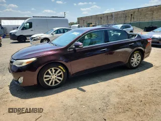 2013 Toyota Avalon XLE with VIN 4T1BK1EB8DU025211, listed as a Copart auction lot 62027495 with 105,975 mi miles and Salvage title. Bid and sale history available at DreamBid. Image 1.
