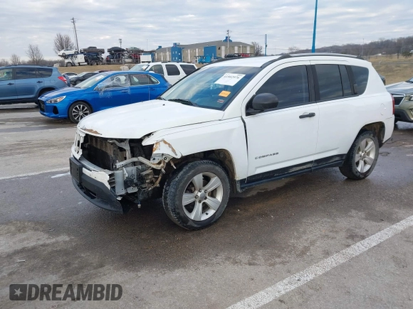 2016 Jeep Compass Sport with VIN 1C4NJDBB5GD804581, listed as a IAAI auction lot 41502976 with 196,351 mi miles and . Bid and sale history available at carsss.com. Image 2.