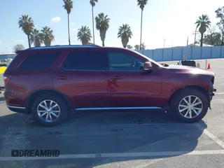 2016 Dodge Durango Limited with VIN 1C4RDHDG5GC459549, listed as a IAAI auction lot 41959863 with 93,760 mi miles. Bid and sale history available at carsss.com. Image 14.