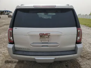 2019 GMC Yukon XL SLT with VIN 1GKS1GKC9KR288660, listed as a Copart auction lot 49669365 with 77,485 mi miles and Salvage Title. Bid and sale history available at carsss.com. Image 6.