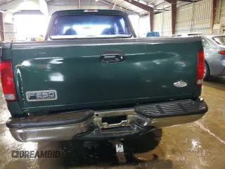 2002 Ford F-250 XL with VIN 1FTNW20F52EA52699, listed as a Copart auction lot 84088814 with 299,869 mi miles and Salvage Title. Bid and sale history available at DreamBid. Image 6.