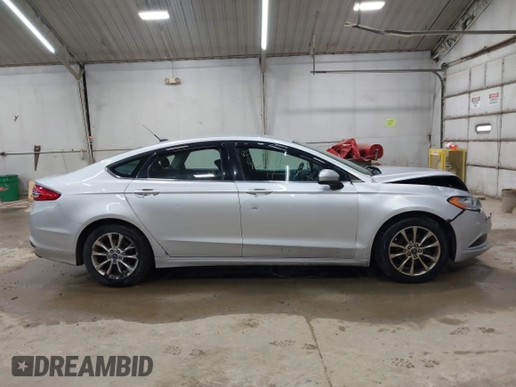 2017 Ford Fusion SE with VIN 3FA6P0H70HR150568, listed as a IAAI auction lot 42012659 with 223,881 mi miles and . Bid and sale history available at DreamBid. Image 13.